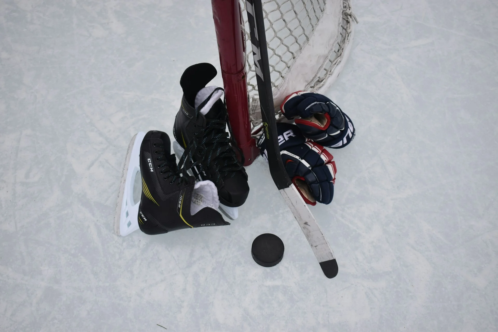 close up of hockey skates and goal