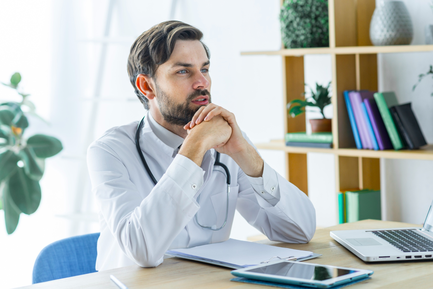 Doctor meeting with a patient in a medical office, illustrating how communication and trust strengthen the patient-provider relationship.