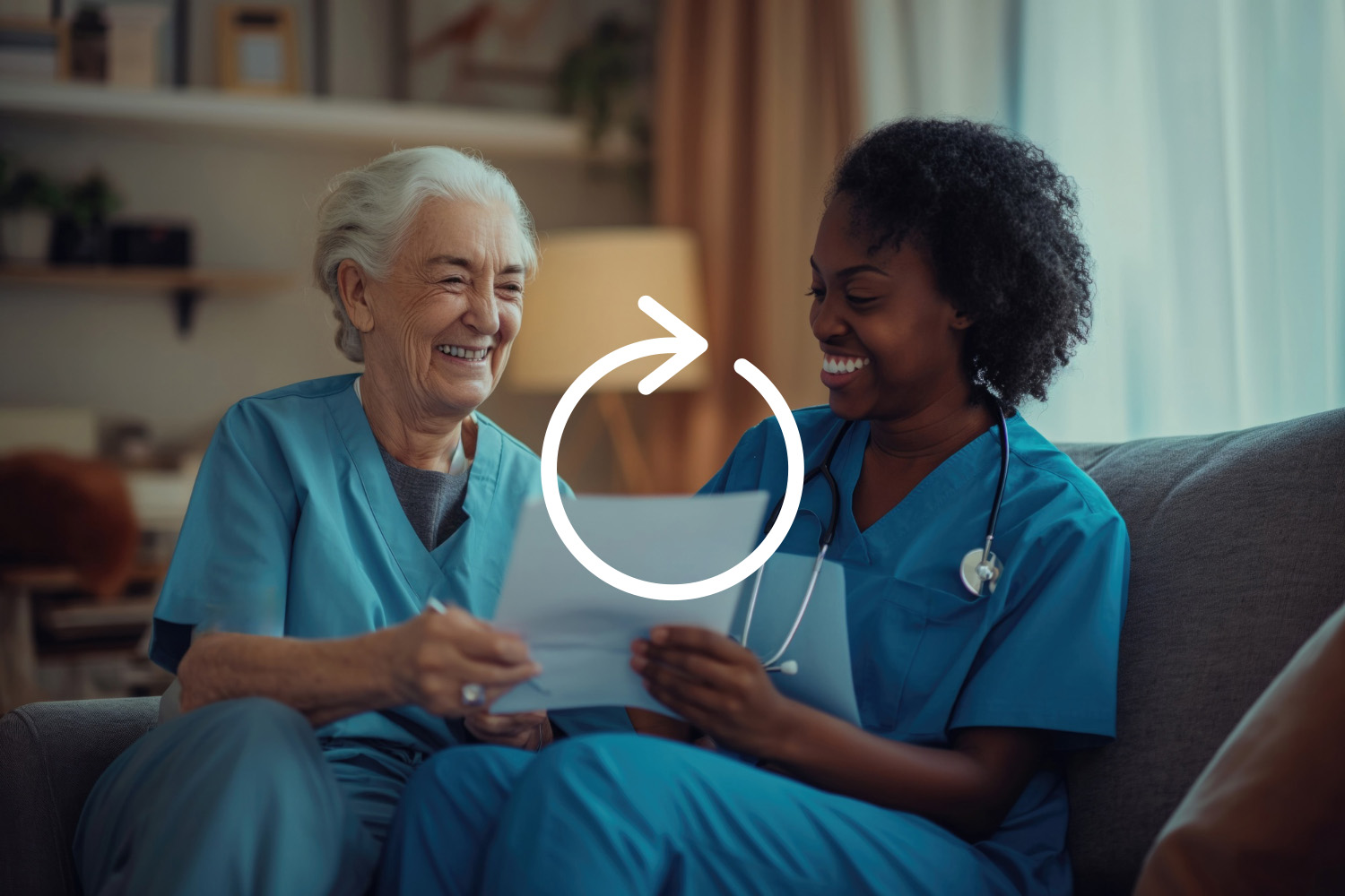 Nurse reviewing paperwork with a senior patient during an in-home healthcare visit.